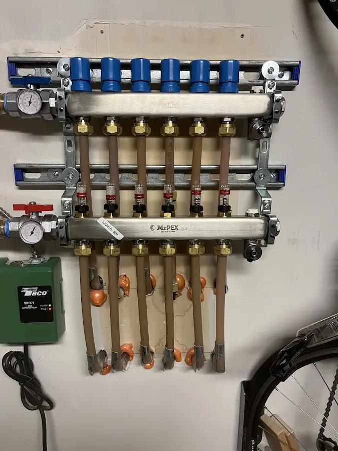 Plumber performing Water Heater Repair at a residential property in Clementon